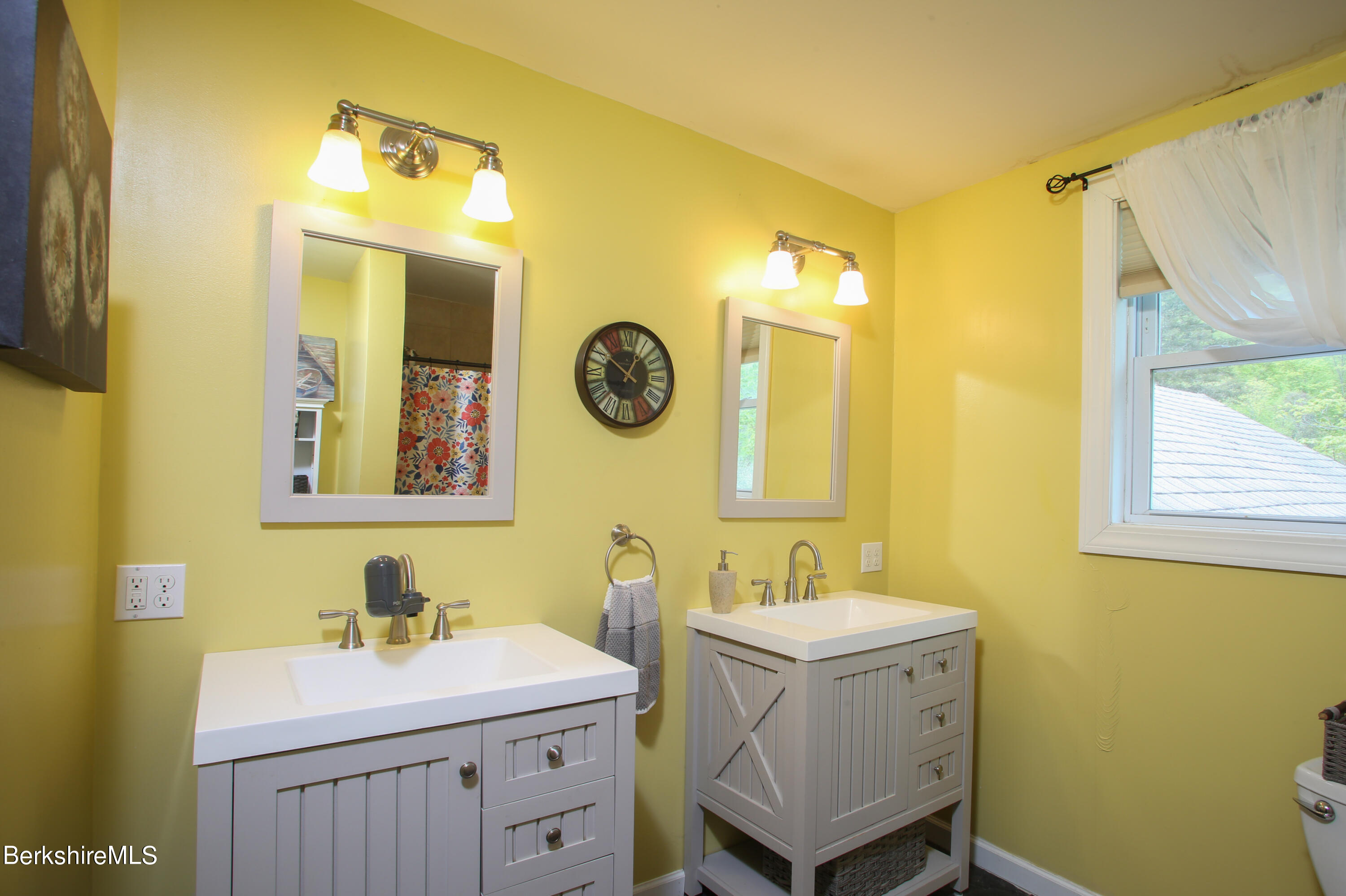 327 River Road Florida, MA 01247 - Photo 29 of 33 a bathroom with a sink mirror vanity and toilet