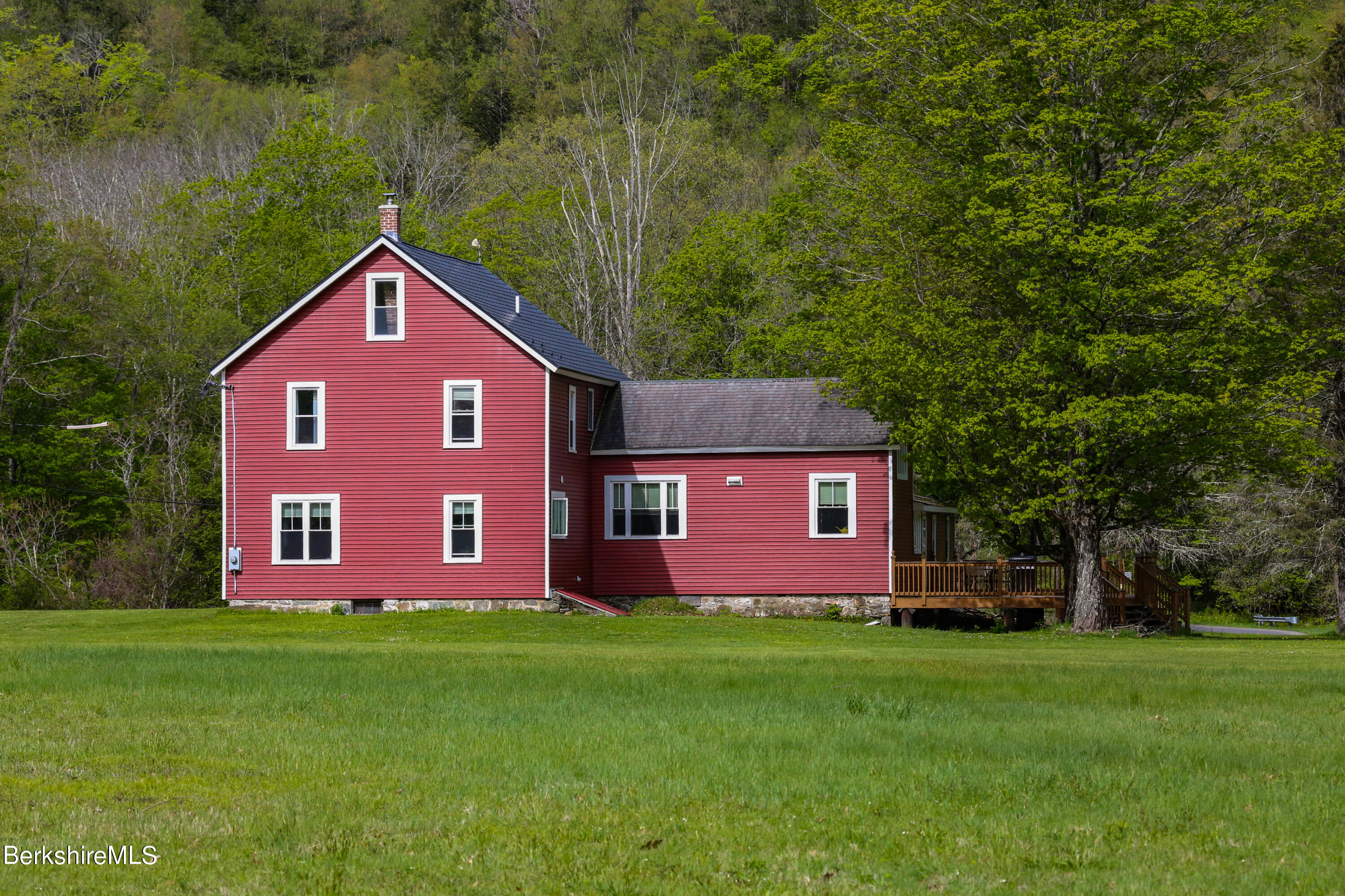 327 River Road Florida, MA 01247 - Photo 5 of 33 a front view of a house with garden