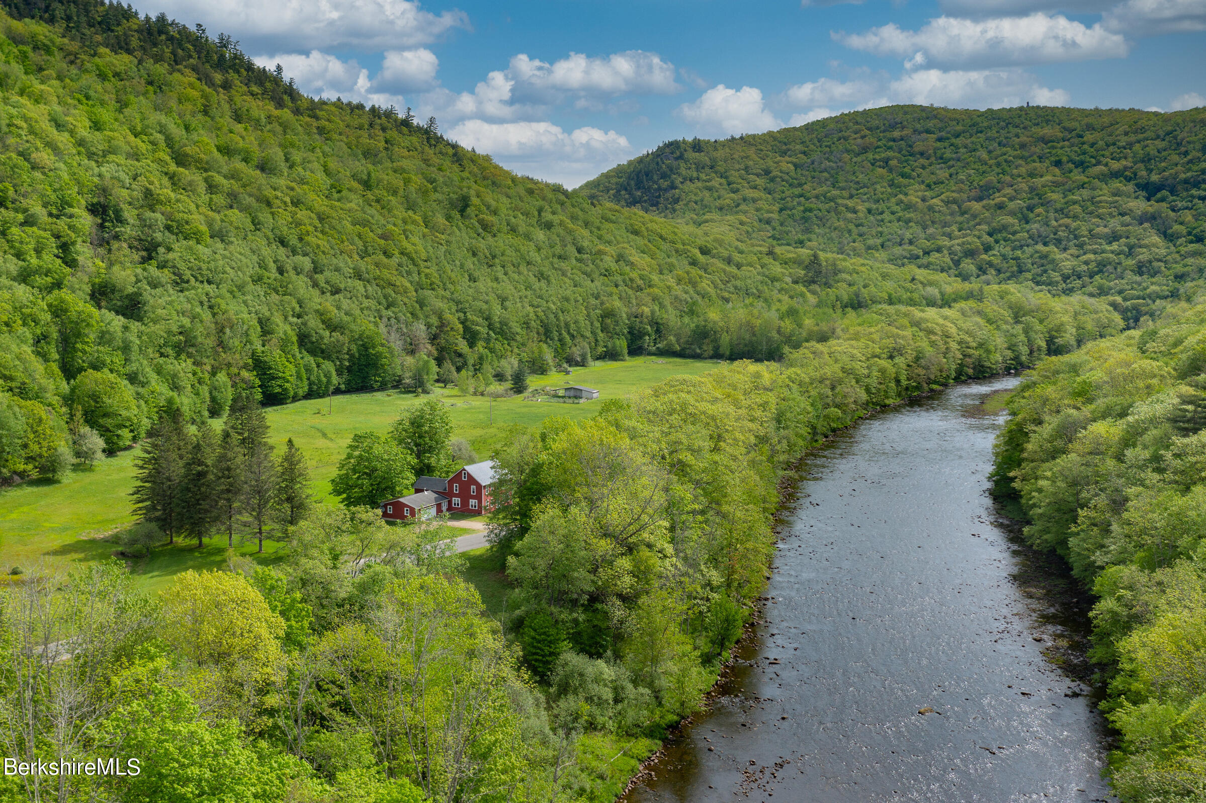 327 River Road Florida, MA 01247 - Photo 6 of 33 a view of a street with a building in the background