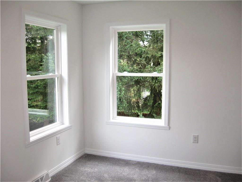 3903 Zimmerly Road Erie, PA 16506 - Photo 18 of 25 a view of an empty room with a window