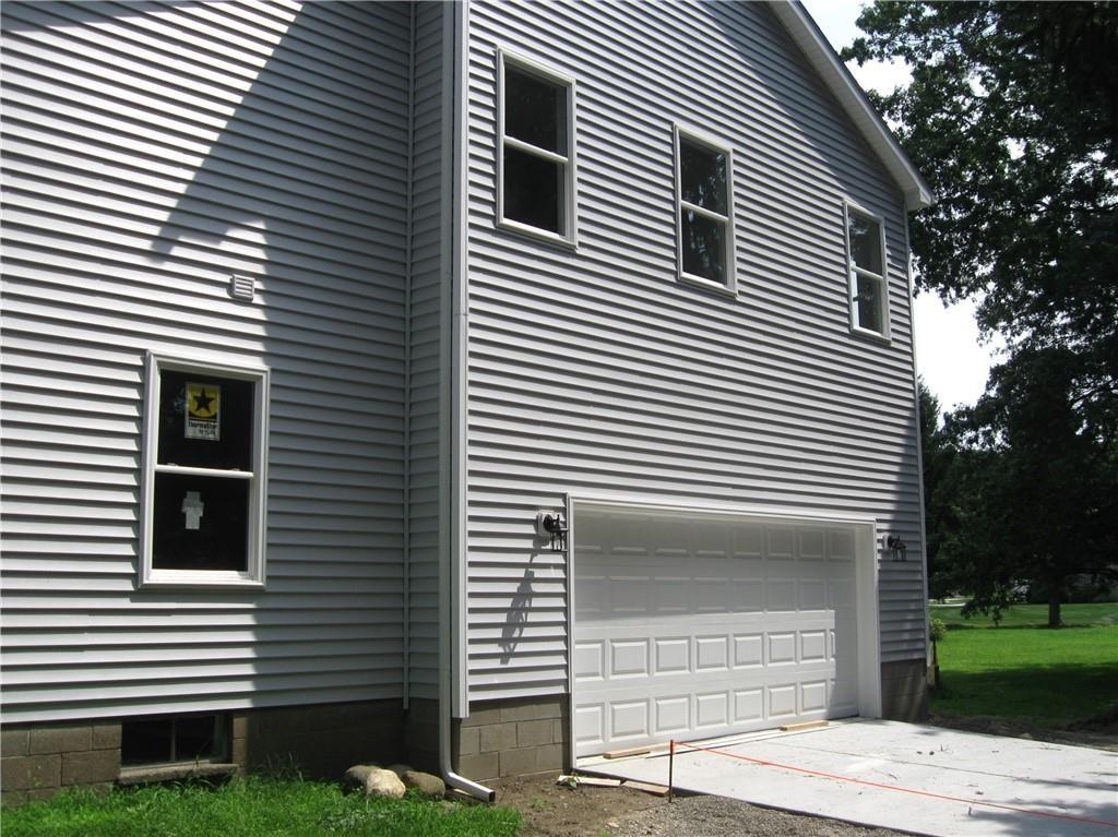 3903 Zimmerly Road Erie, PA 16506 - Photo 3 of 25 a view of a house with a door and a yard