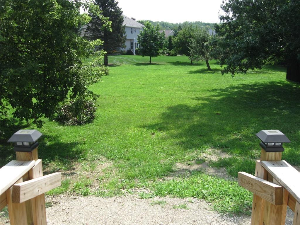 3903 Zimmerly Road Erie, PA 16506 - Photo 21 of 25 a view of a garden with a fountain