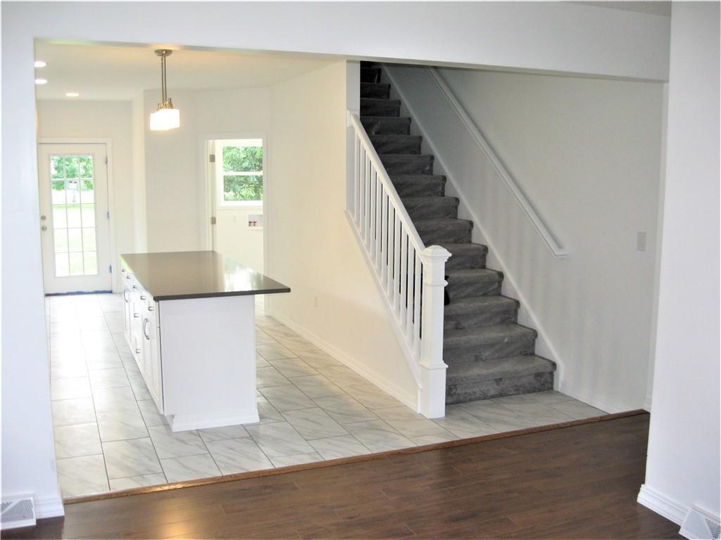 3903 Zimmerly Road Erie, PA 16506 - Photo 8 of 25 a view of entryway and hall with wooden floor