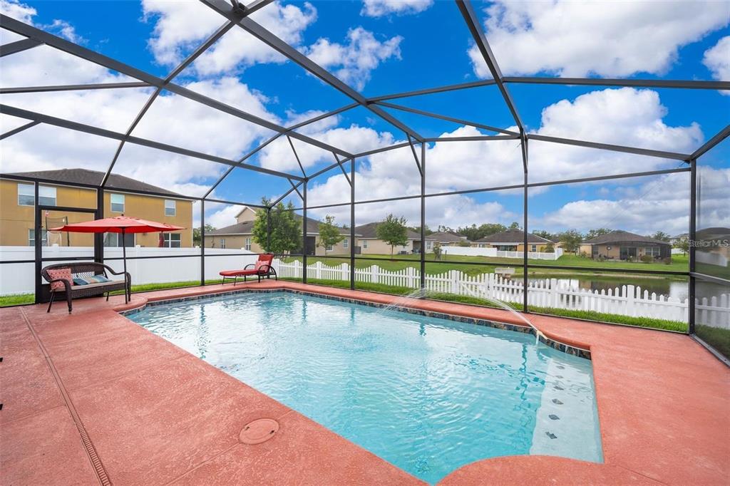 3406 Brant Street St. Cloud, FL 34772 - Photo 27 of 33 a view of a swimming pool with a lounge chairs