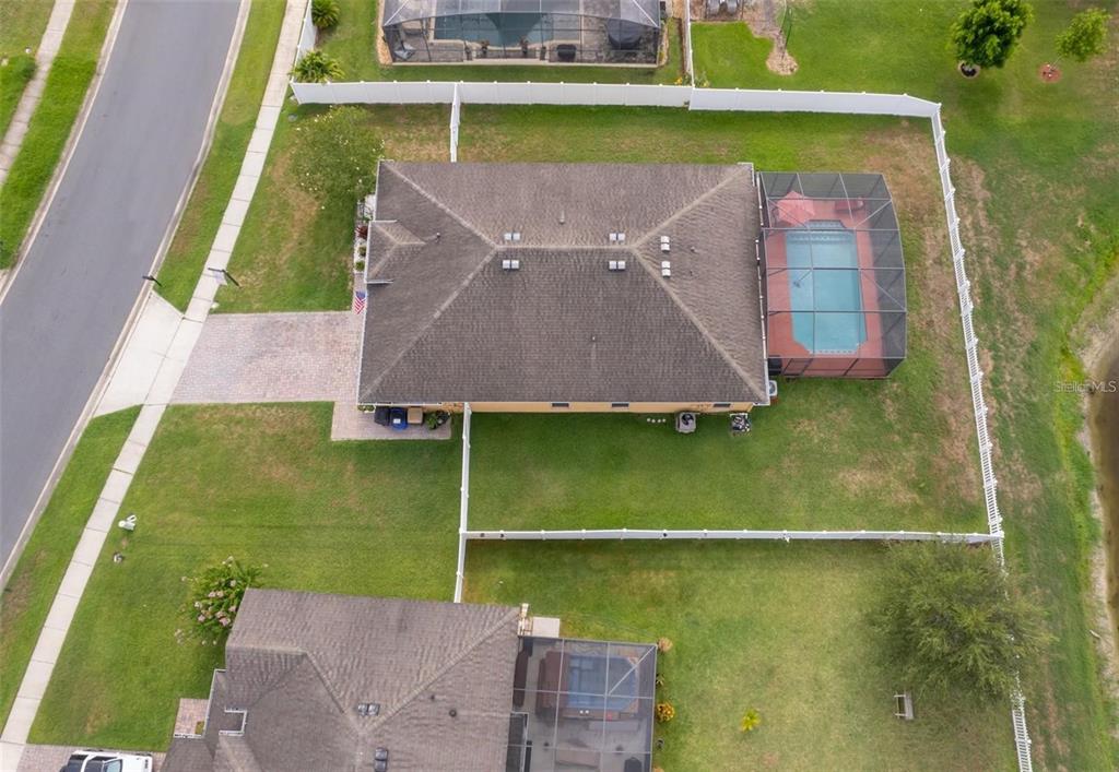 3406 Brant Street St. Cloud, FL 34772 - Photo 4 of 33 an aerial view of a house with a yard