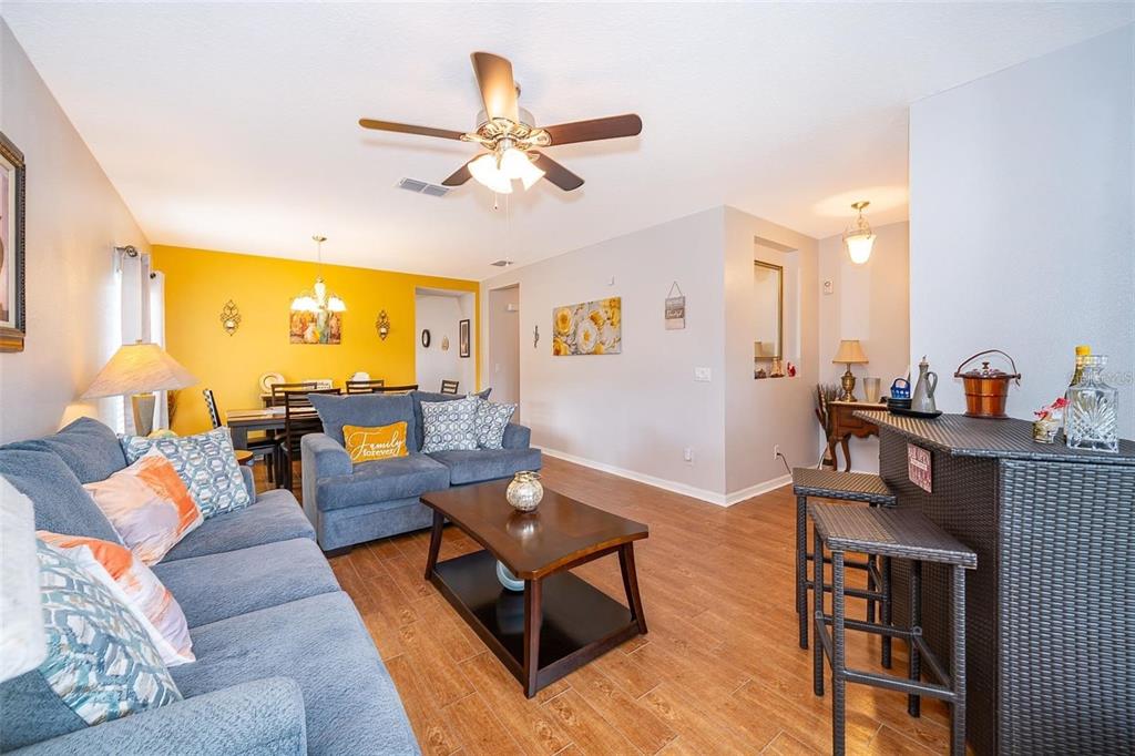 3406 Brant Street St. Cloud, FL 34772 - Photo 8 of 33 a living room with furniture and a large window