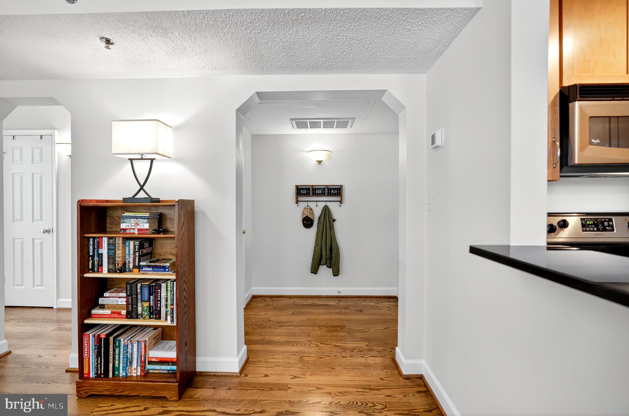 500 Bashford Lane, Unit 3321 Alexandria, VA 22314 - Photo 6 of 20 a view of a cabinet with a bookshelf