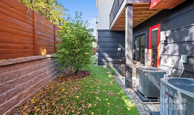a backyard of a house with lots of green space