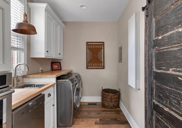 a view of cabinets with wooden floor