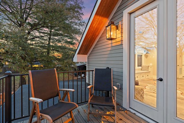 a kitchen with cabinets and window
