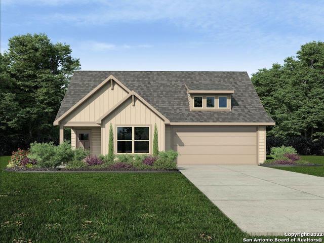 a view of front of house with a yard