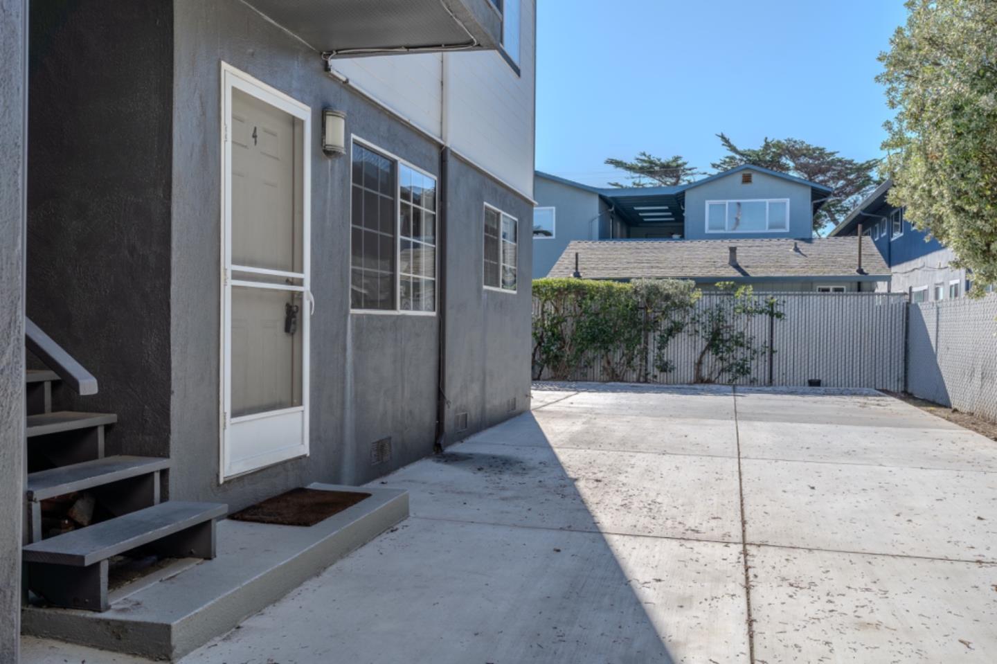 102 Brighton Road, Unit 4 Pacifica, CA 94044 - Photo 2 of 10 a view of a back yard of the house