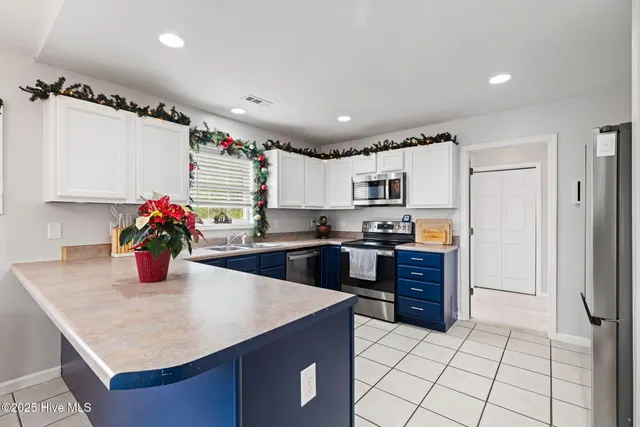 $655,000 | 813 Driftwood Drive, Hampstead, NC 28443