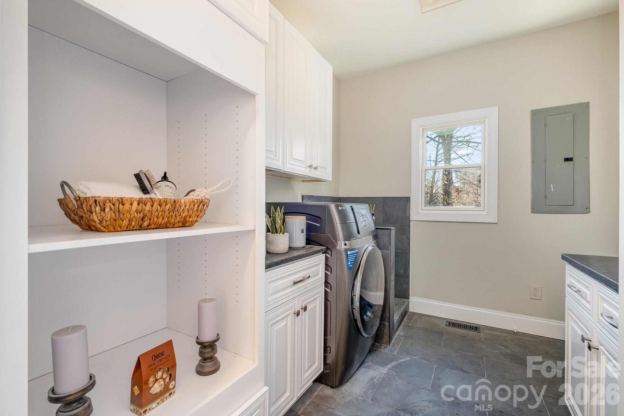 20105 Chapel Point Lane Cornelius, NC 28031 - Photo 22 of 39 a storage room with washer and dryer