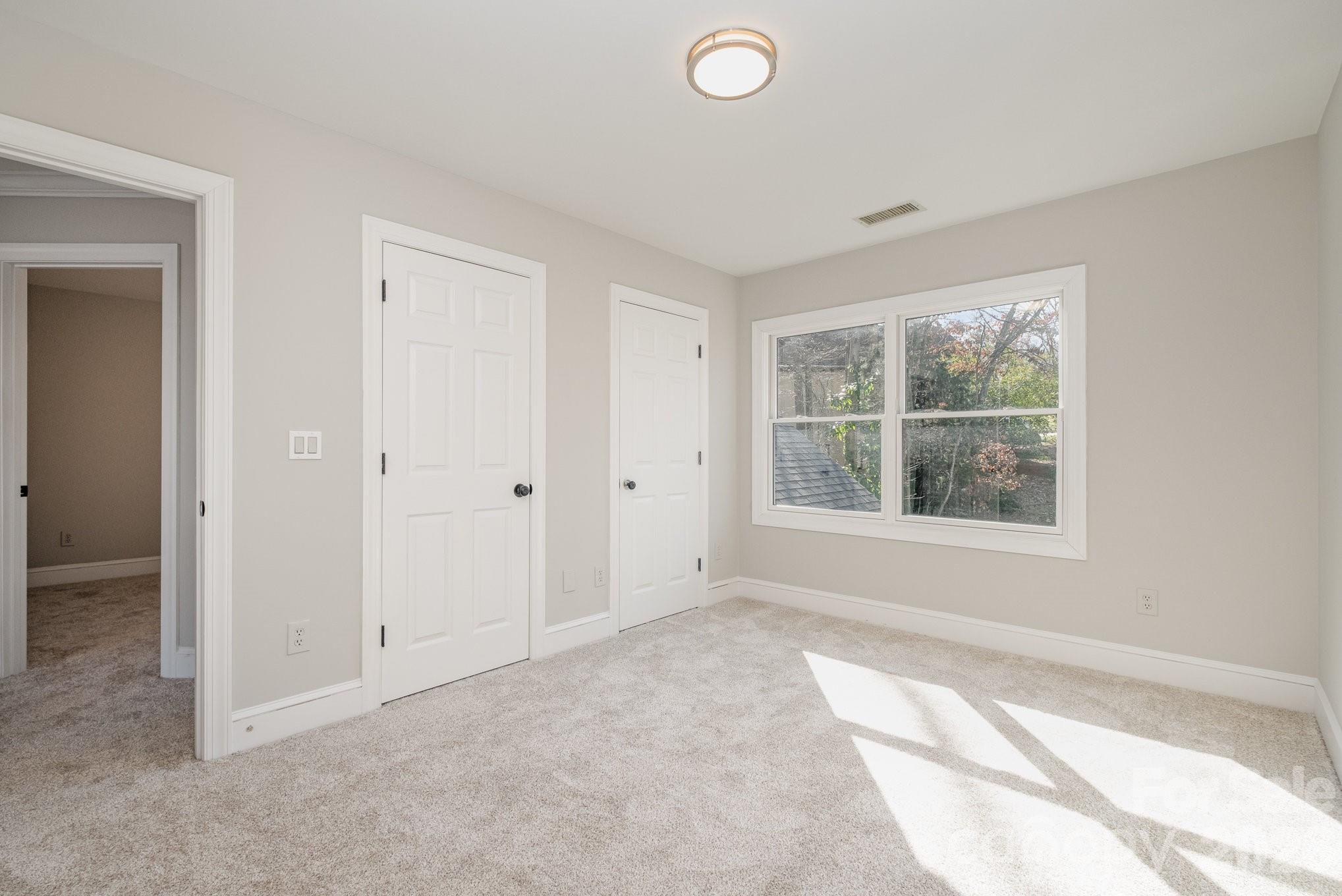 20105 Chapel Point Lane Cornelius, NC 28031 - Photo 29 of 39 an empty room with windows