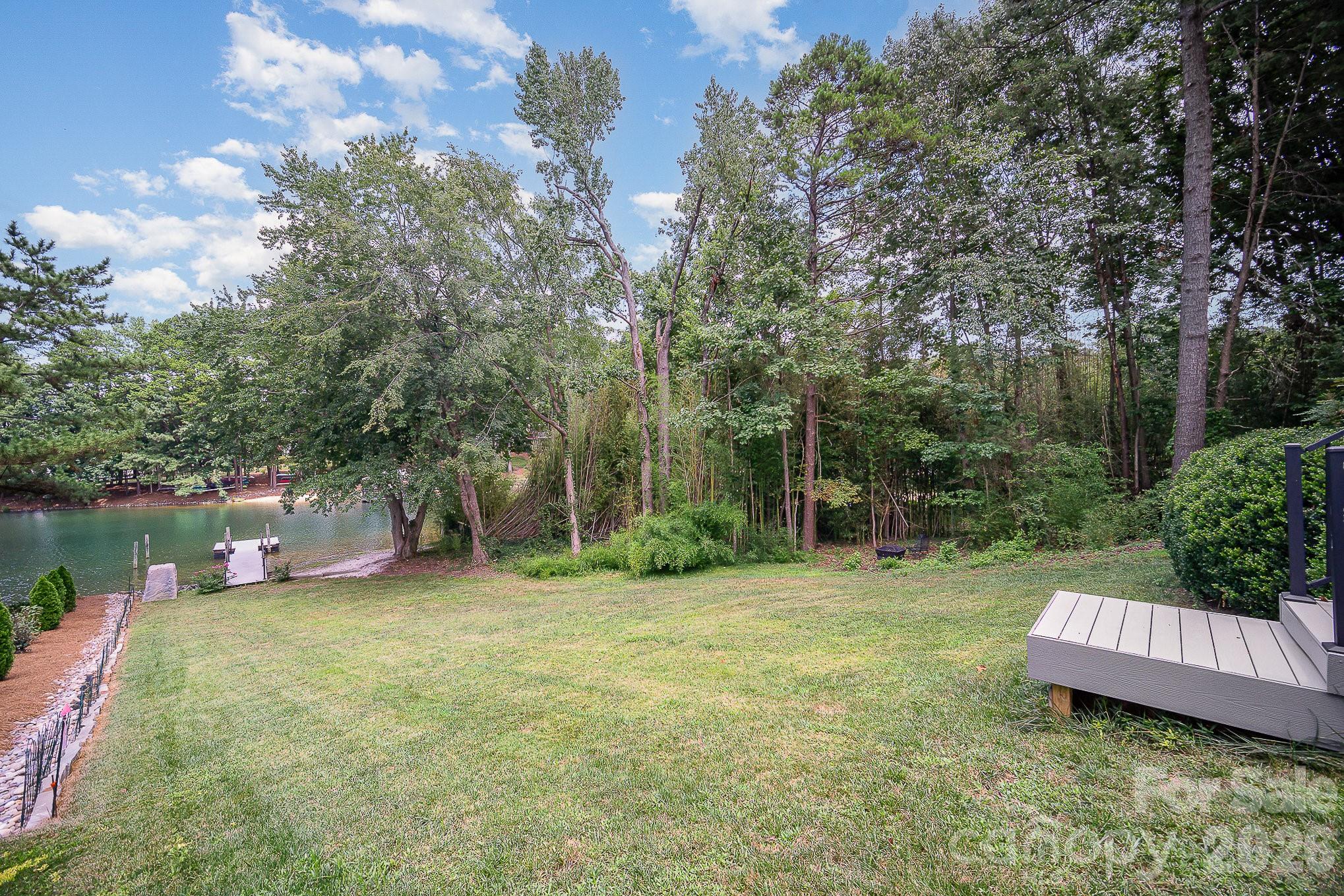 20105 Chapel Point Lane Cornelius, NC 28031 - Photo 32 of 39 a view of a backyard with a garden