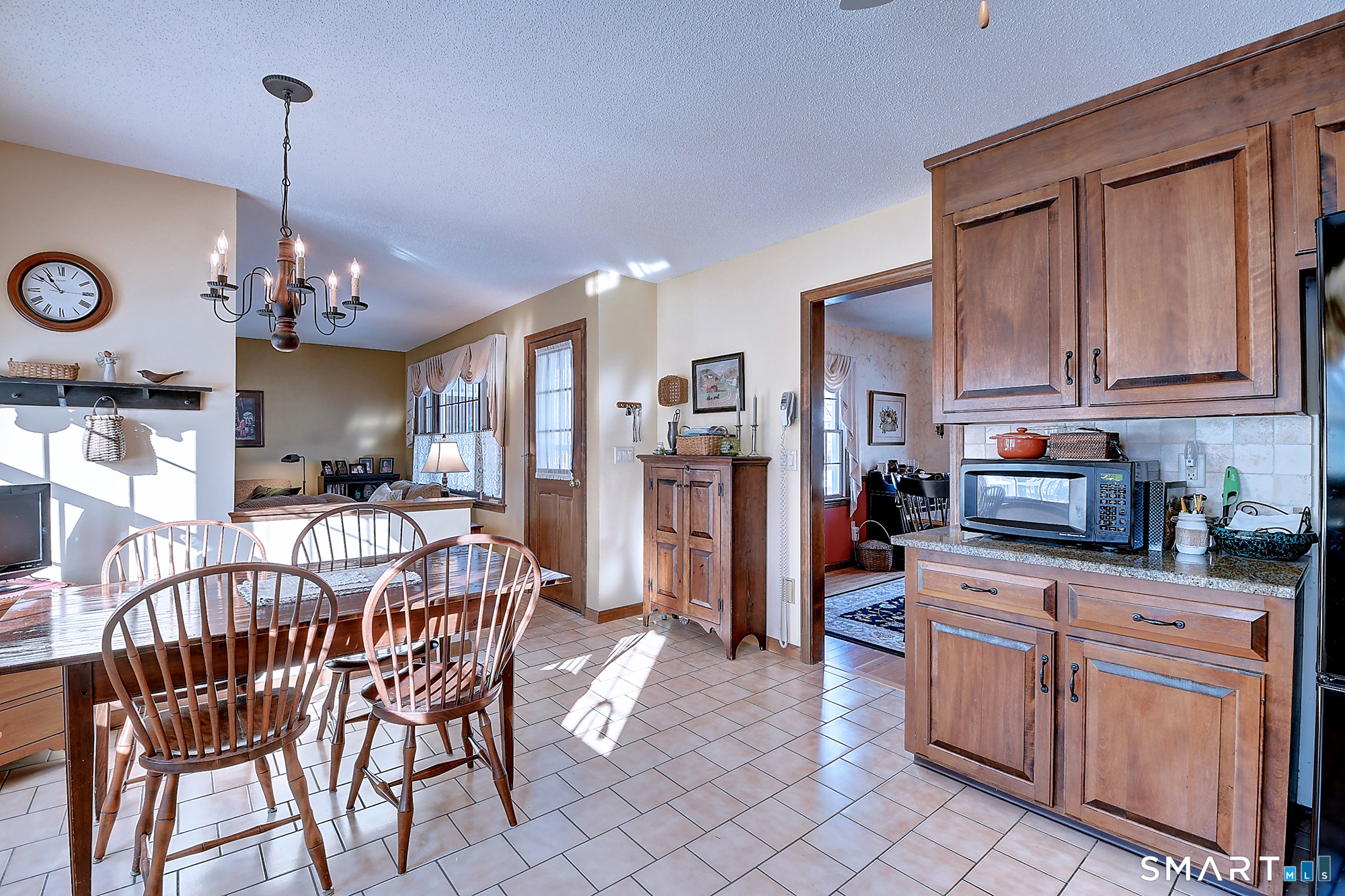 48 Devonshire Drive South Windsor, CT 06074 - Photo 11 of 35 a view of a kitchen and dining room