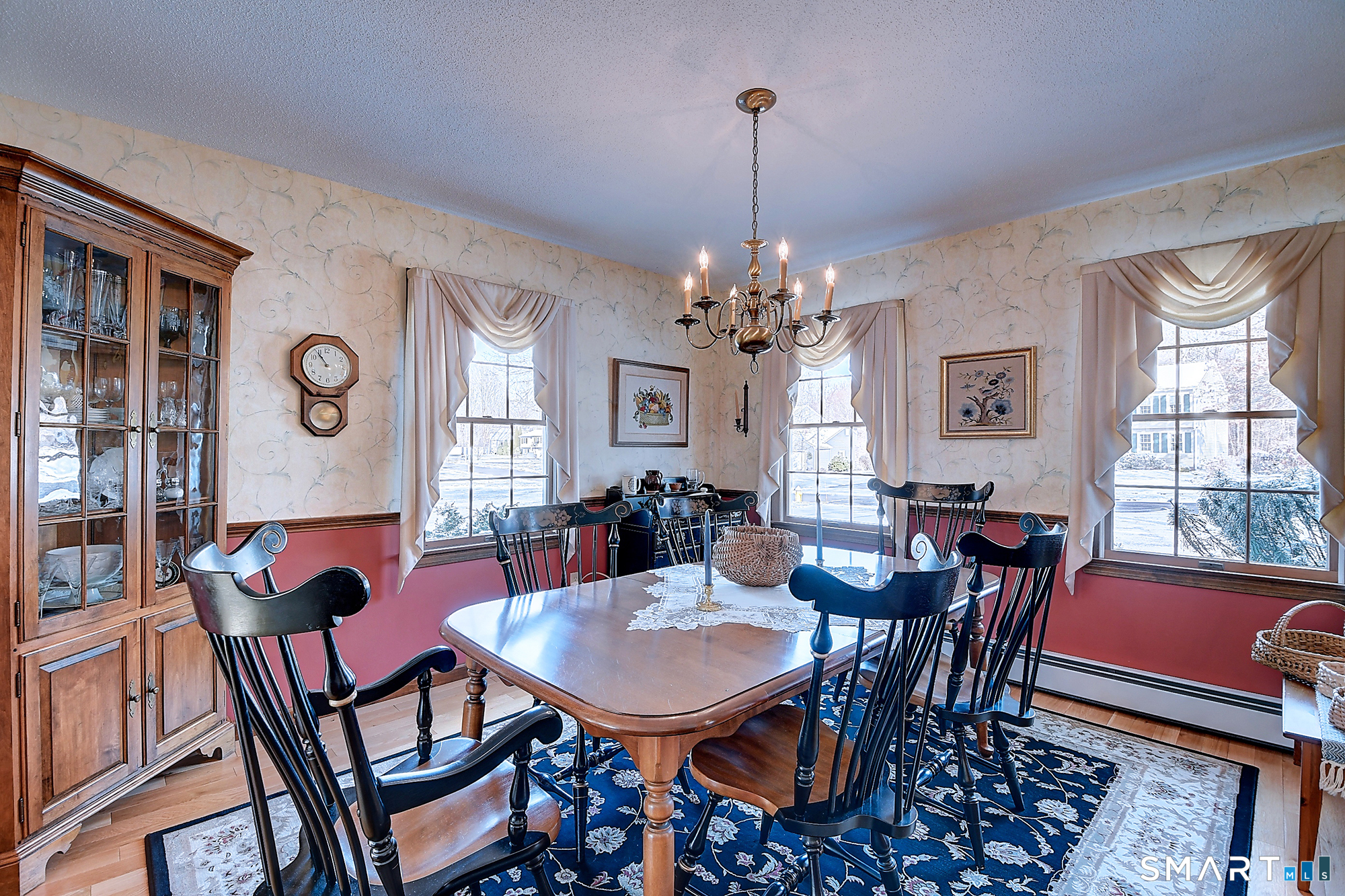 48 Devonshire Drive South Windsor, CT 06074 - Photo 13 of 35 a view of a dining room with furniture and chandelier