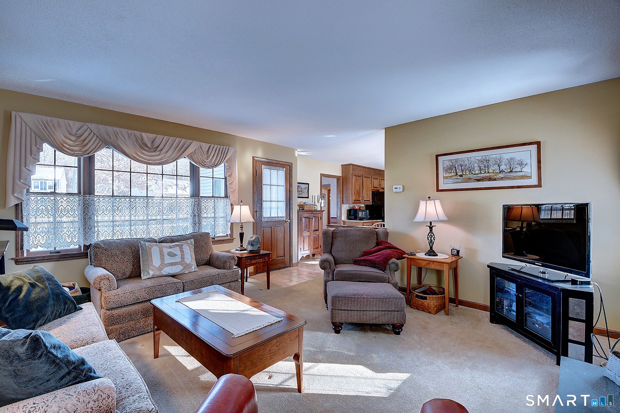 48 Devonshire Drive South Windsor, CT 06074 - Photo 16 of 35 a living room with furniture and a flat screen tv
