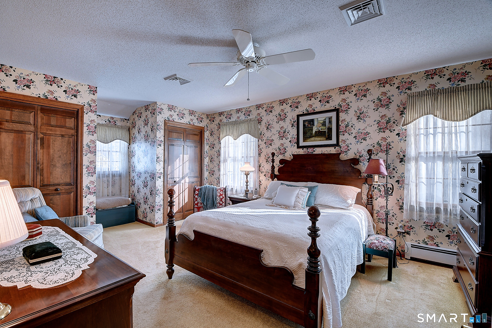 48 Devonshire Drive South Windsor, CT 06074 - Photo 24 of 35 a bedroom with a bed mirror and a window