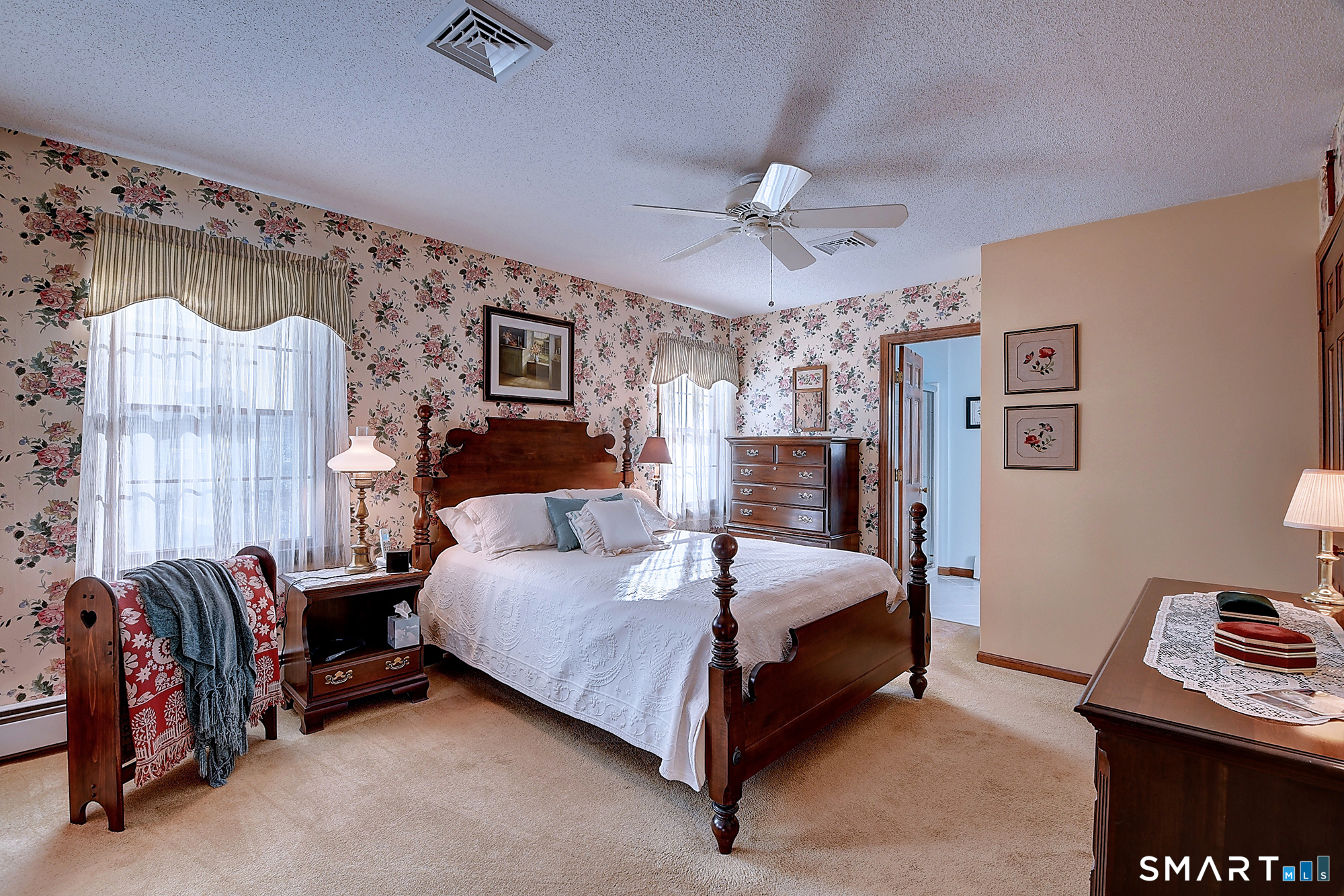 48 Devonshire Drive South Windsor, CT 06074 - Photo 26 of 35 a bedroom with a bed and a couch