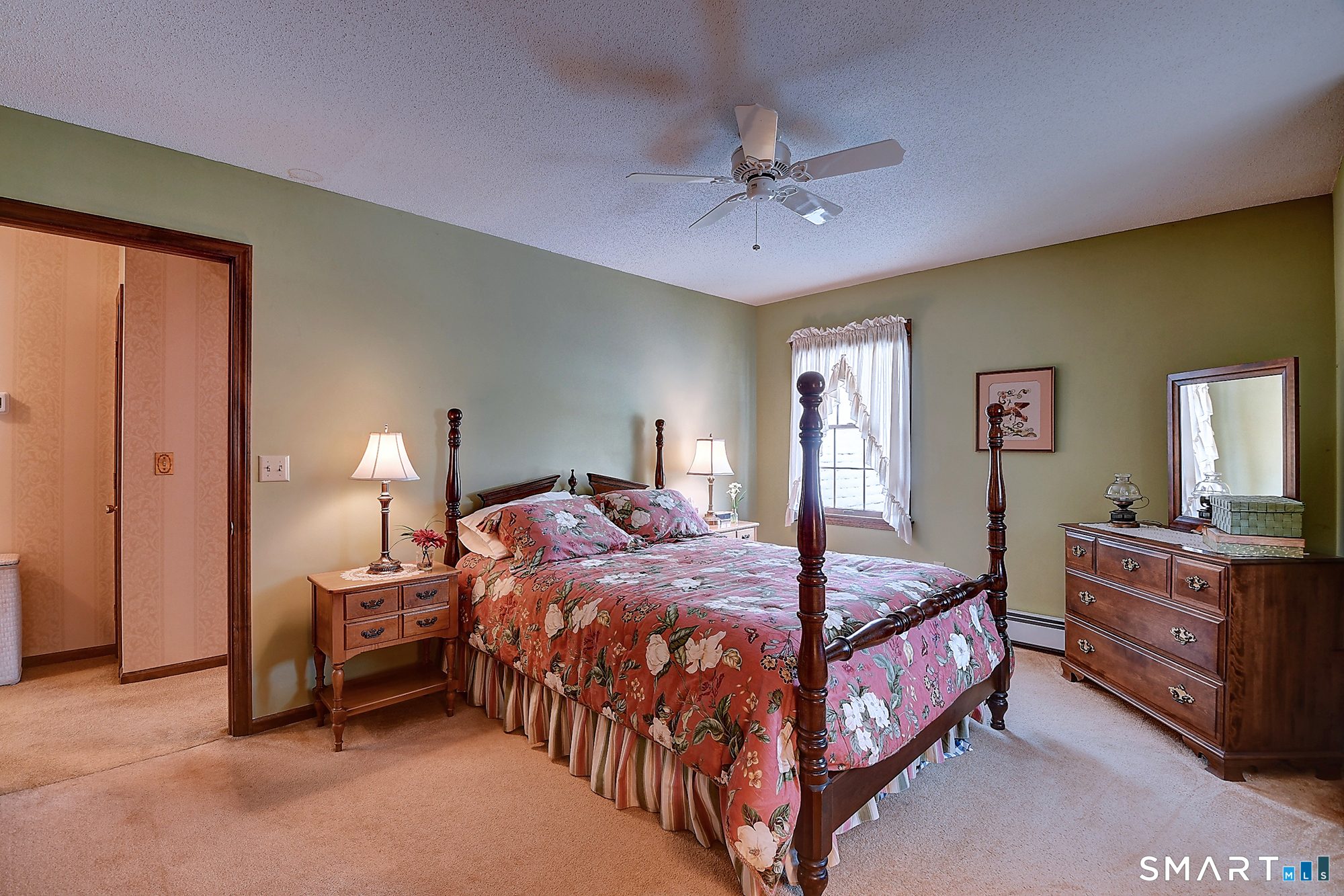 48 Devonshire Drive South Windsor, CT 06074 - Photo 32 of 35 a bedroom with a bed and dresser