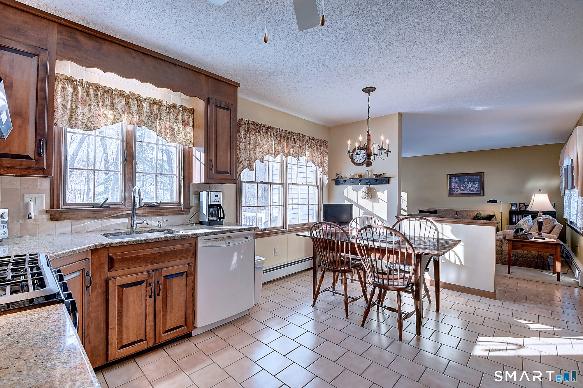 48 Devonshire Drive South Windsor, CT 06074 - Photo 10 of 35 a kitchen with lots of counter top space and dining table