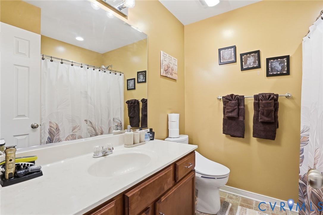 19012 Teman Road Beaverdam, VA 23015 - Photo 18 of 41 a bathroom with a sink and a mirror