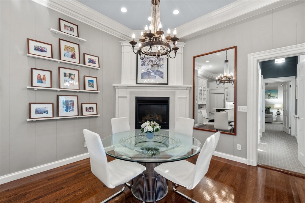 10 Cartwright Road Wellesley, MA 02482 - Photo 15 of 42 a view of a dining room with furniture wooden floor and a chandelier