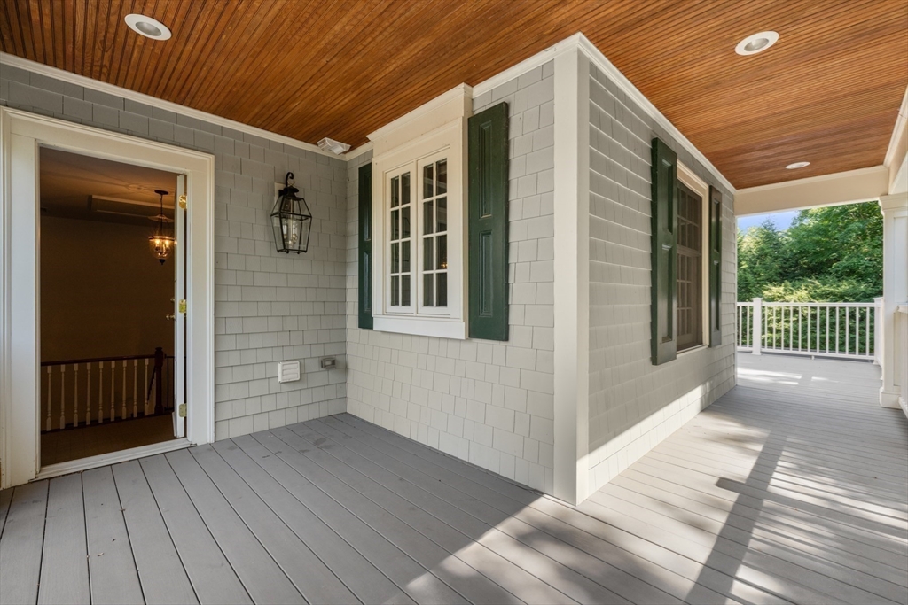 10 Cartwright Road Wellesley, MA 02482 - Photo 29 of 42 a view of a house with a deck