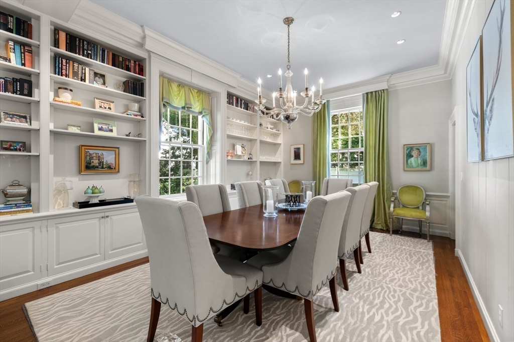 10 Cartwright Road Wellesley, MA 02482 - Photo 9 of 42 a view of a dining room with furniture a rug and wooden floor