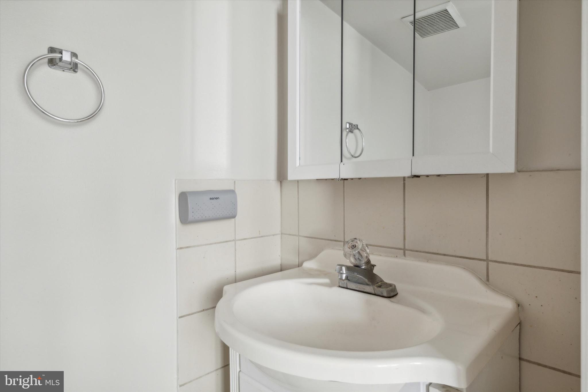 20 South Village Avenue, Unit 3 Exton, PA 19341 - Photo 12 of 17 a bathroom with a sink and mirror