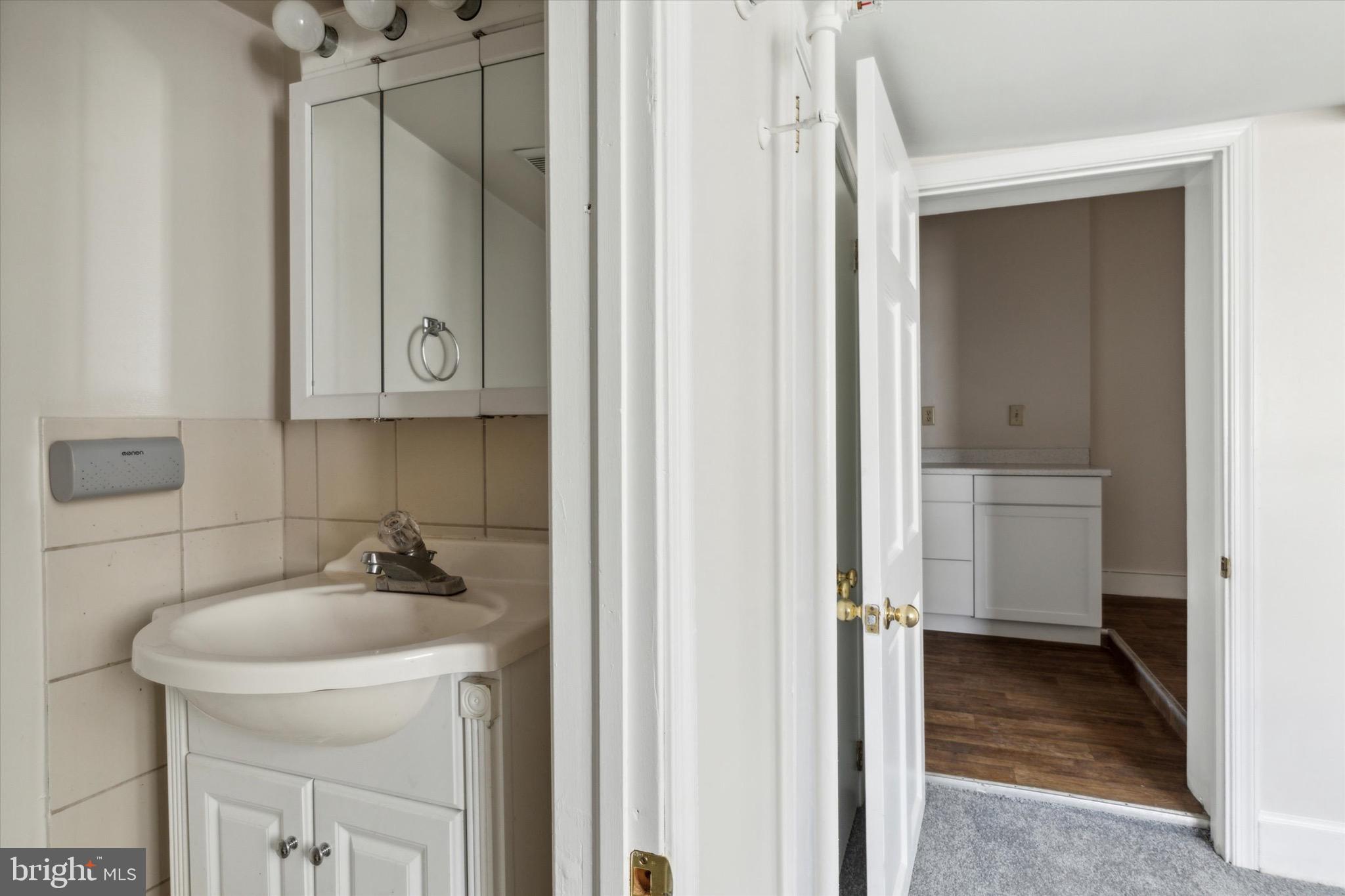 20 South Village Avenue, Unit 3 Exton, PA 19341 - Photo 13 of 17 a bathroom with a sink and a toilet
