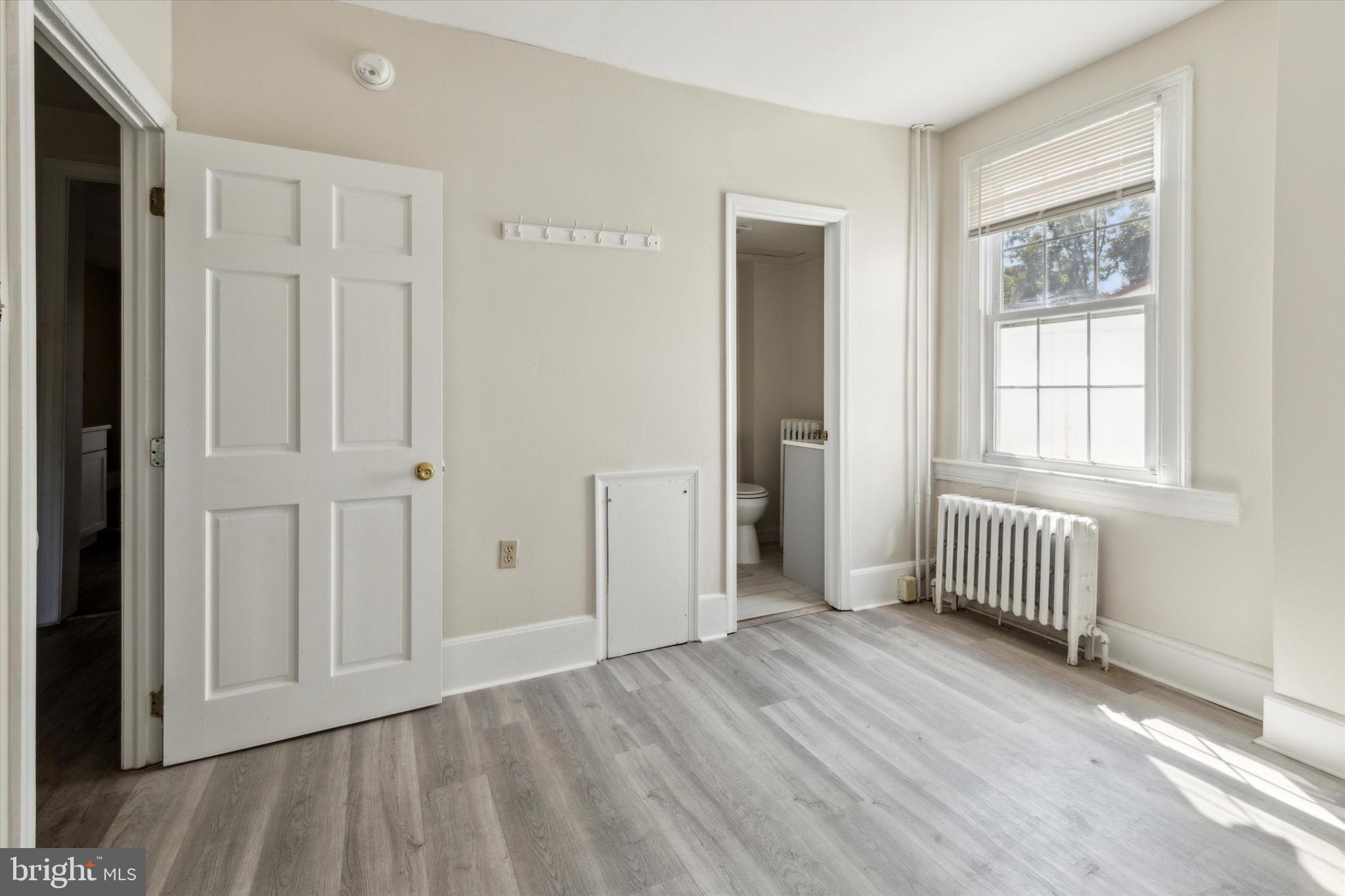 20 South Village Avenue, Unit 3 Exton, PA 19341 - Photo 4 of 17 a view of empty room with wooden floor