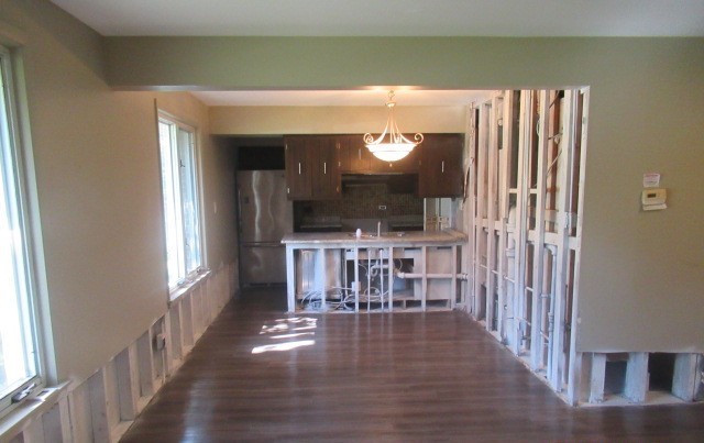 10429 Austin Avenue, Unit A Oak Lawn, IL 60453 - Photo 9 of 16 a view of a hallway with wooden floor and windows