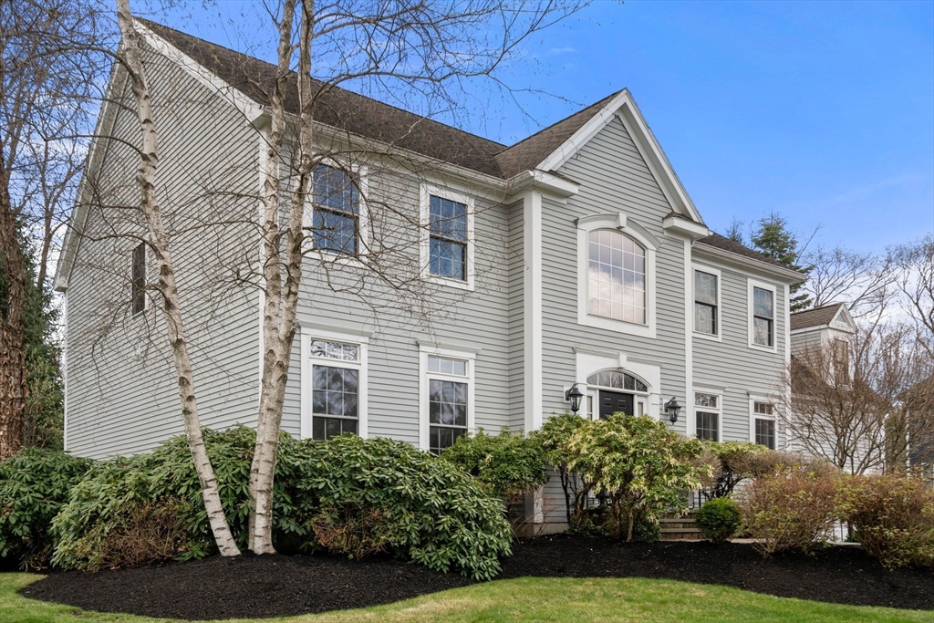 20 Rons Way Framingham, MA 01701 - Photo 2 of 41 front view of a house with a yard