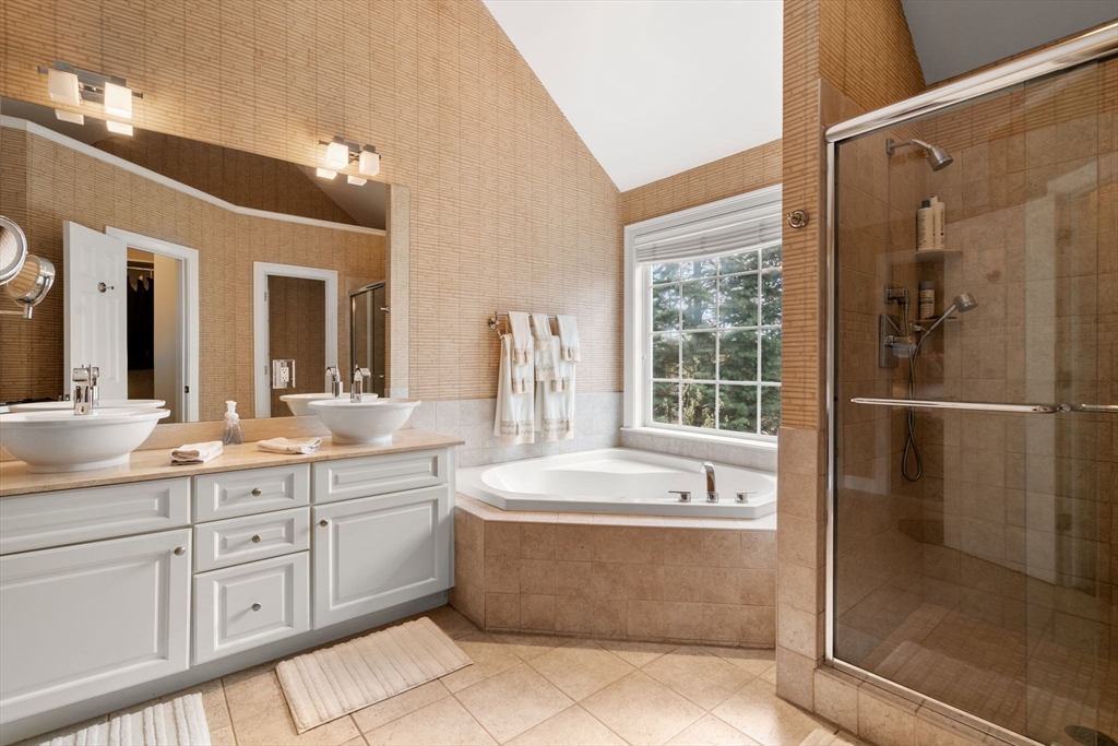 20 Rons Way Framingham, MA 01701 - Photo 27 of 41 a spacious bathroom with a tub sink shower and mirror