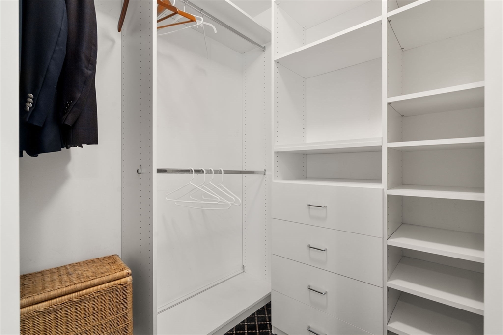 20 Rons Way Framingham, MA 01701 - Photo 28 of 41 a view of walk in closet with empty racks