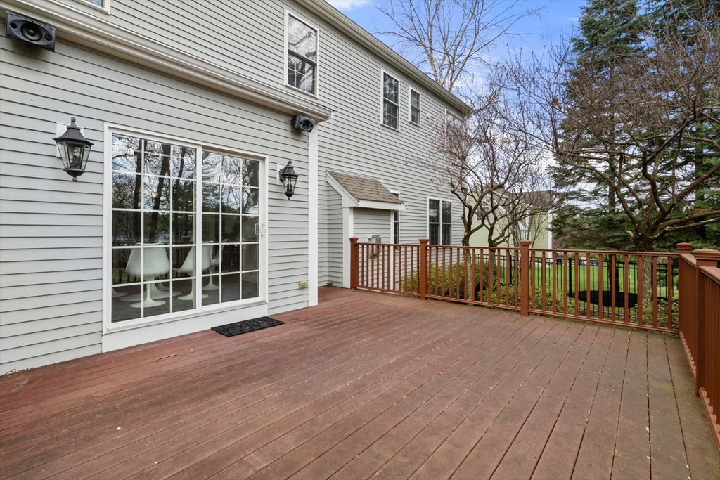 20 Rons Way Framingham, MA 01701 - Photo 38 of 41 a view of a house with a wooden deck