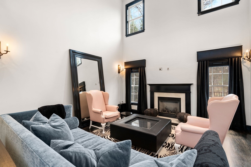20 Rons Way Framingham, MA 01701 - Photo 10 of 41 a living room with furniture mirror and a fireplace