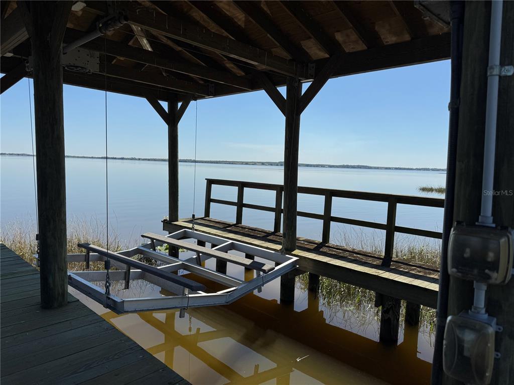 1893 North Lake Reedy Boulevard Frostproof, FL 33843 - Photo 51 of 56 a view of a car park from a balcony