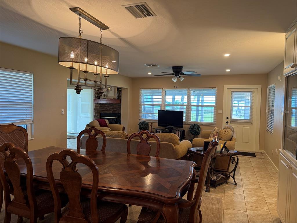 1893 North Lake Reedy Boulevard Frostproof, FL 33843 - Photo 8 of 56 a view of a dining room with furniture