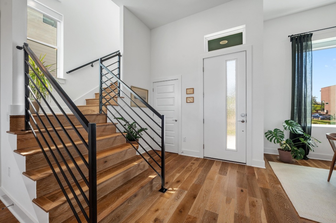 5428 Agatha Circle Austin, TX 78724 - Photo 12 of 40 a view of an entryway with wooden floor and door