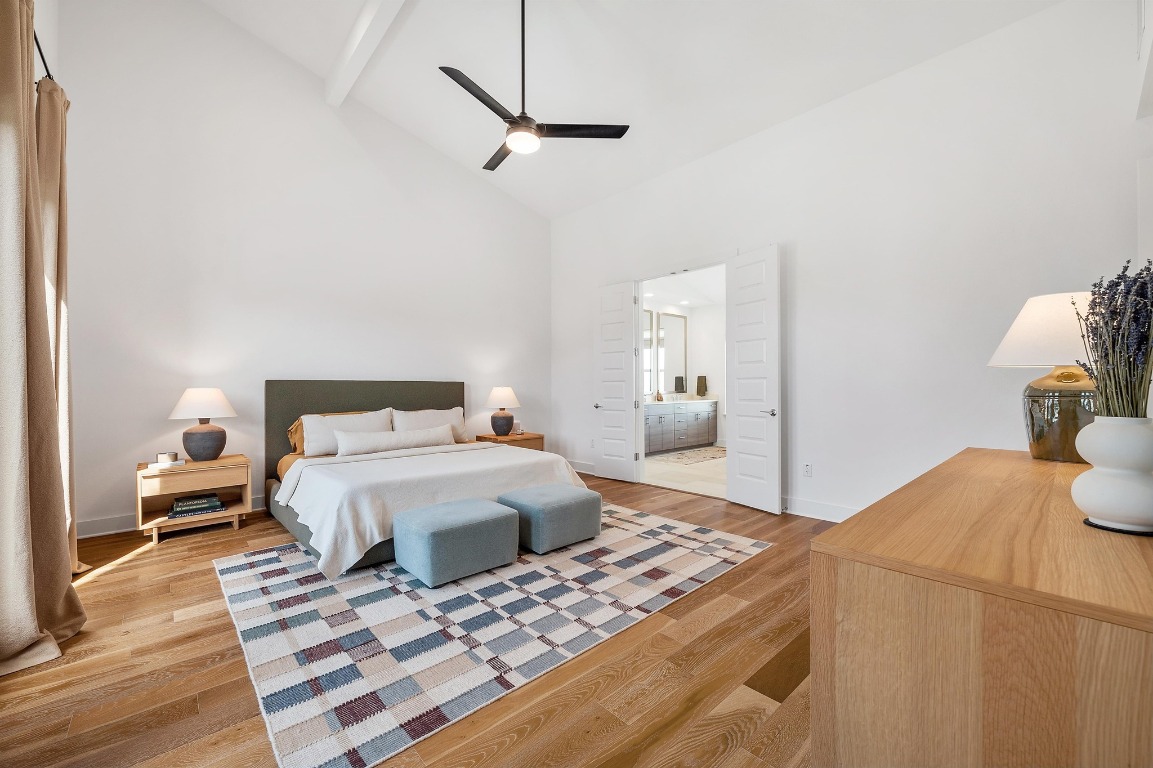 5428 Agatha Circle Austin, TX 78724 - Photo 14 of 40 a bedroom with a bed and wooden floor