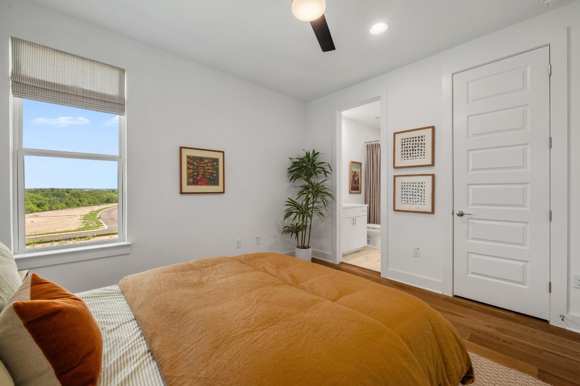 5428 Agatha Circle Austin, TX 78724 - Photo 22 of 40 a bedroom with a bed and a window