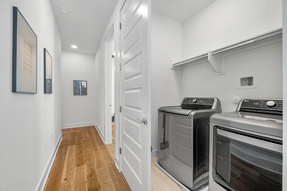 5428 Agatha Circle Austin, TX 78724 - Photo 26 of 40 a kitchen with a stove and a refrigerator
