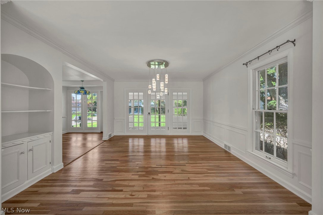 3543 Lytle Road Shaker Heights, OH 44122 - Photo 24 of 49 Hardwood flooring throughout, featuring extensive crown molding and wainscoting