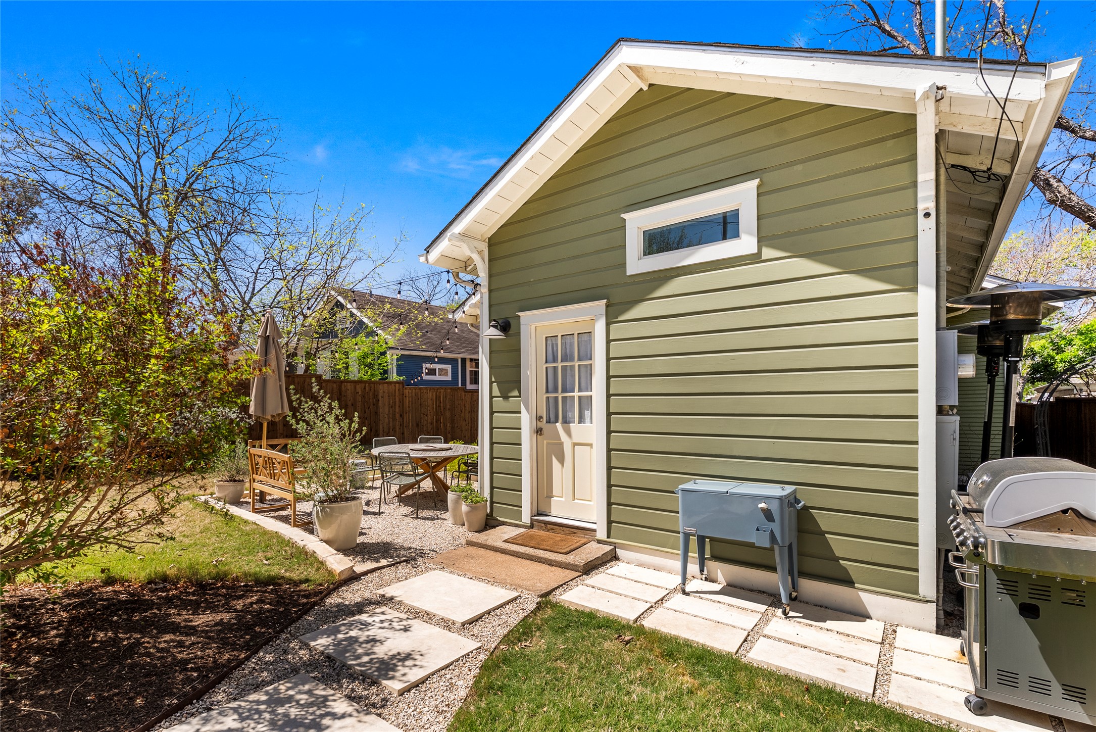 1809 Nickerson Street Austin, TX 78704 - Photo 28 of 31 a view of backyard with a chair and tables
