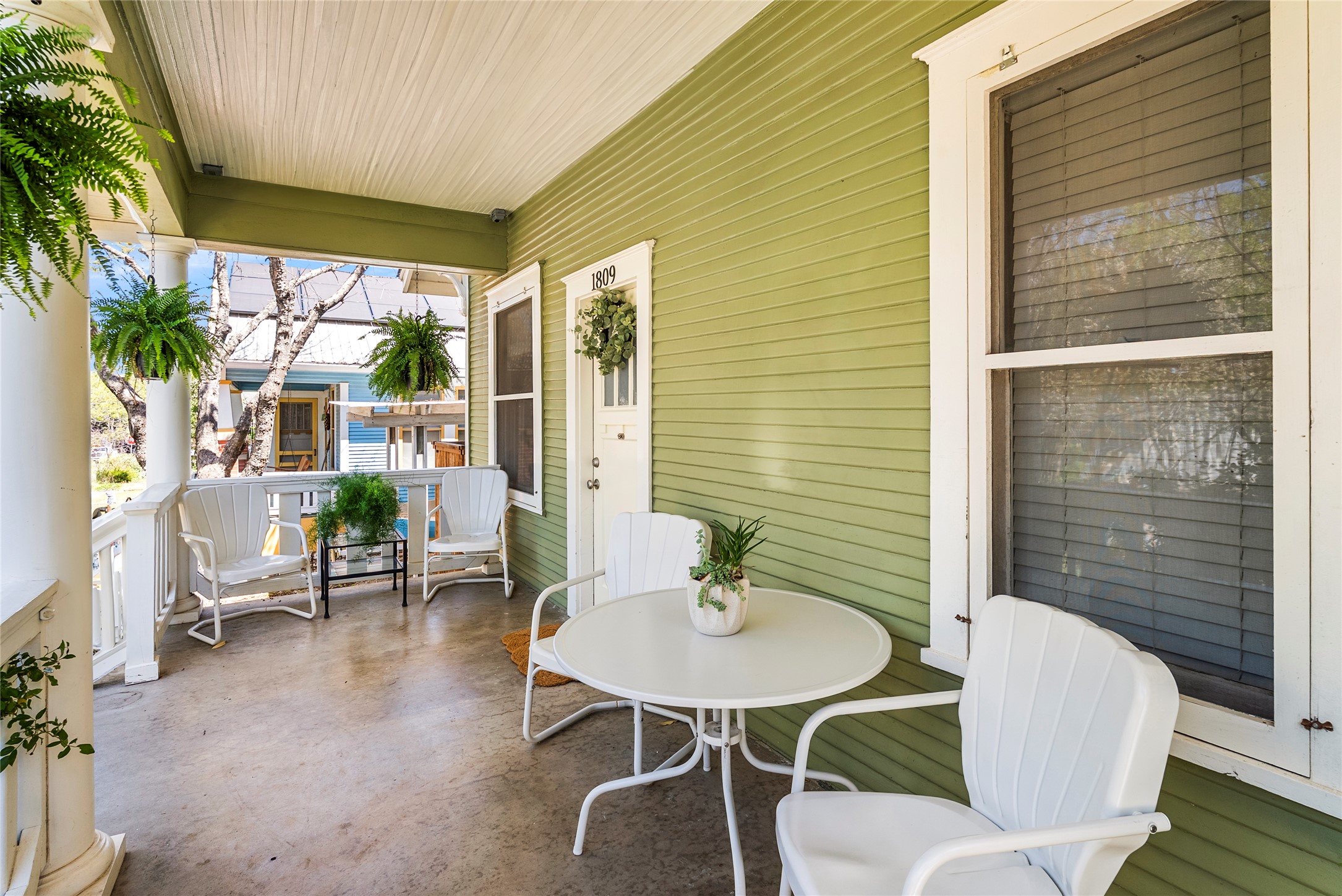 1809 Nickerson Street Austin, TX 78704 - Photo 3 of 31 a balcony with table and chairs