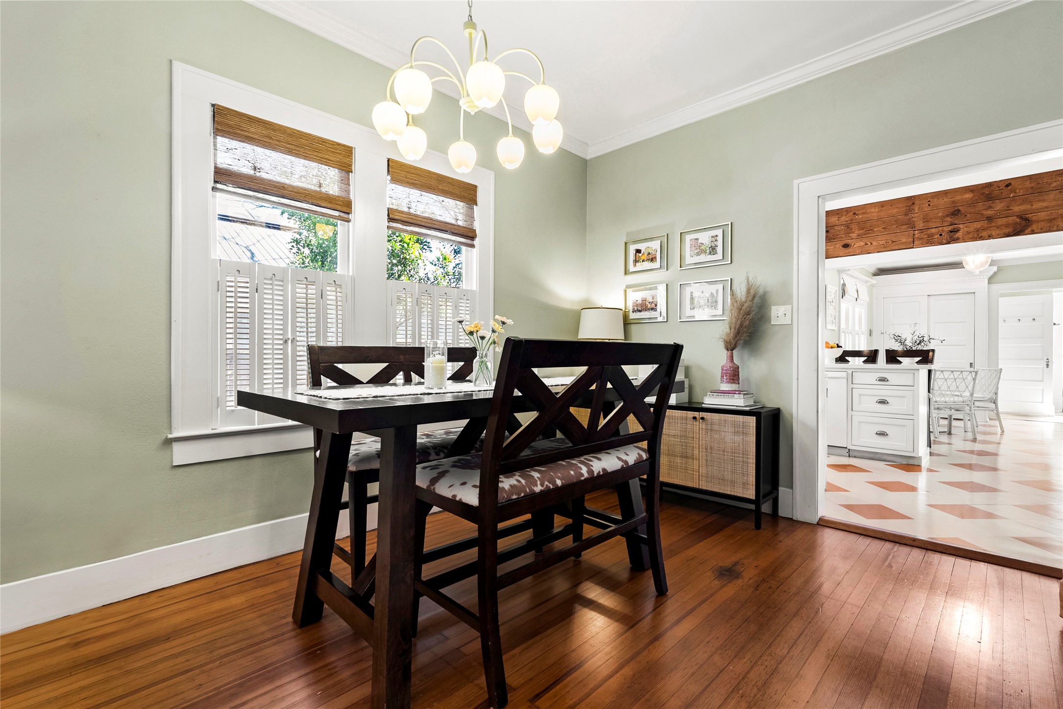 1809 Nickerson Street Austin, TX 78704 - Photo 7 of 31 a dining room with furniture a chandelier and wooden floor